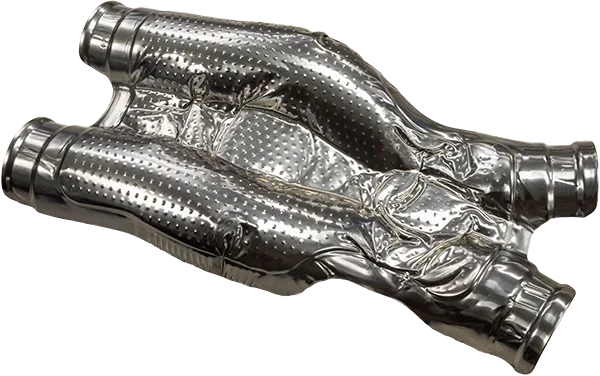 An embossed heat shield in a complex geometry designed to fit around an automotive exhaust system An embossed heat shield in a complex geometry designed to fit around an automotive exhaust system