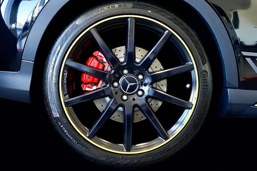 Close-up of an automobile wheel and wheel well Close-up of an automobile wheel and wheel well