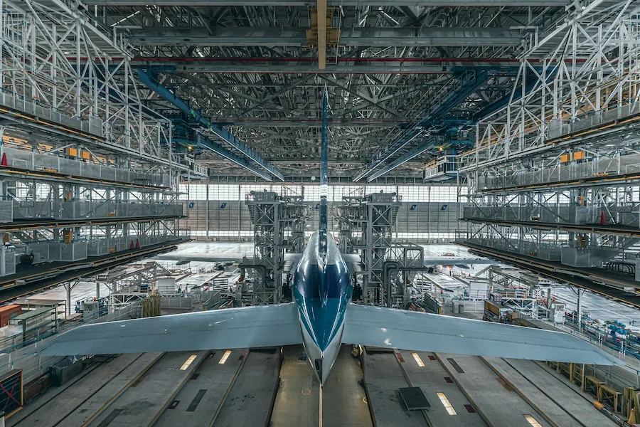 An aircraft in a hangar bay An aircraft in a hangar bay