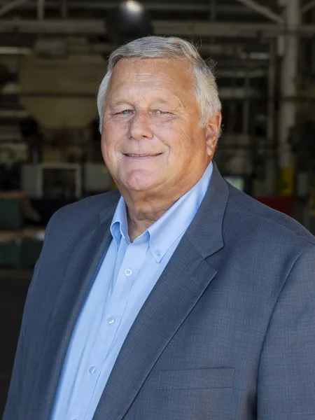 Bob Meeker, Soundwich Advanced Development and Application Engineer Bob Meeker, Soundwich's Advanced Development and Application Engineer. He is wearing a dark blue suit jacket and light blue shirt. Bob has silver hair.