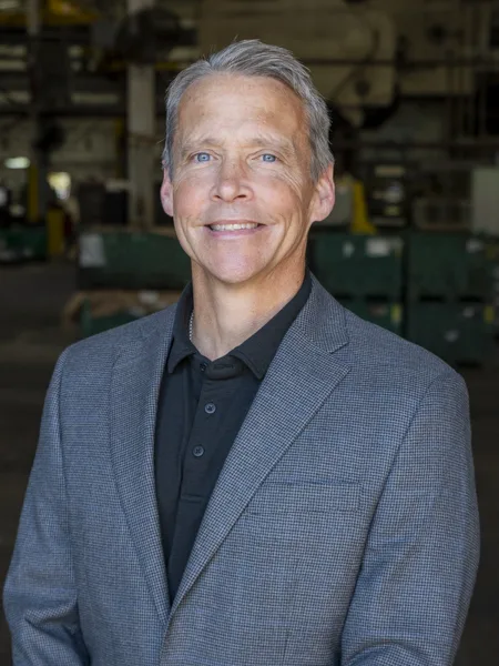 Tim Whalen Soundwich's Director of Sales Tim Whalen Soundwich's Director of Sales. He is wearing a gray jacket and a black button-down shirt. Tim has dark silver hair and bright blue eyes.